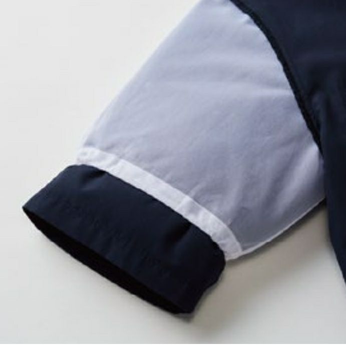 体毛落下防止ネット<br>食品に体毛などが混入するのを防ぐため、アームホール裏部分に体毛落下防止ネットを装備。