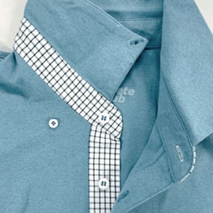 台襟・下前立て配色<br>台襟と前立て下側にさりげないチェック柄。